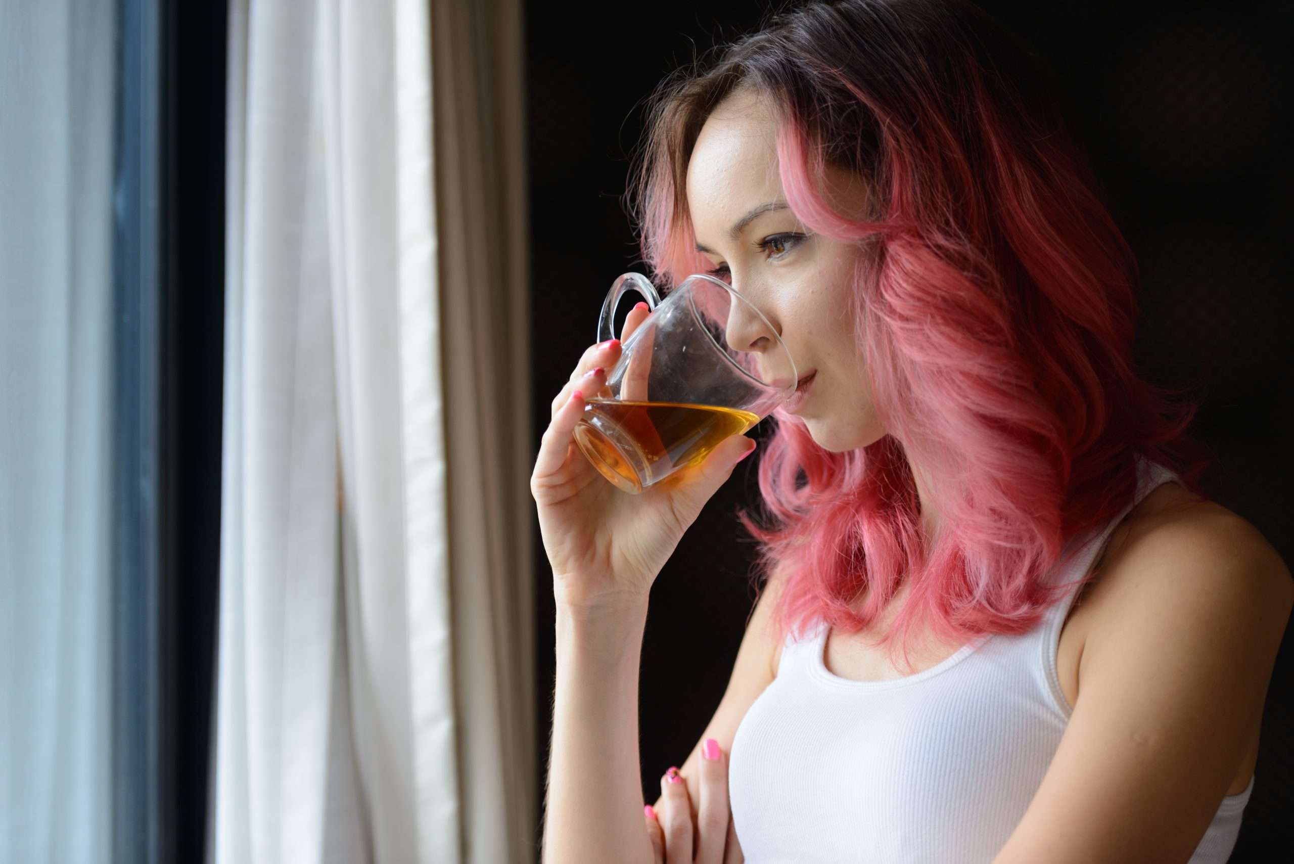 An independent artist enjoying a cup of Pure & Easy Tea between performances