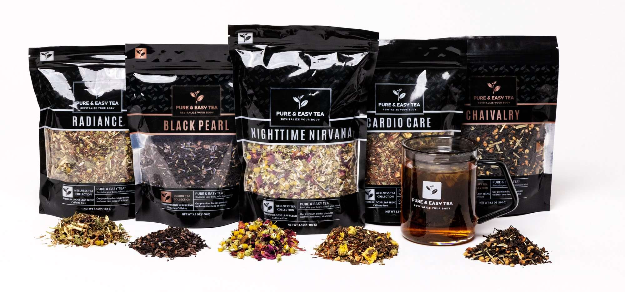 Pure & Easy Tea pouches with loose blends and a glass brewing mug, a Tea Club selection